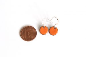 Bright orange circle earrings