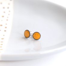 Bright yellow stud earrings