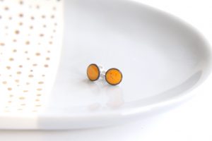 Bright yellow stud earrings